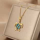 Chantal™ | Collier Tortue en Or avec Opale Bleue | Maya Deauville