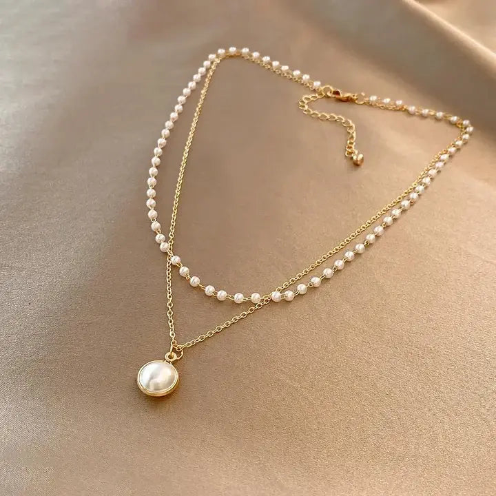 Collier pendentif perle dorée | Maya Deauville